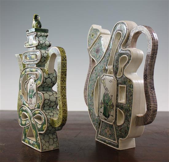 Two Chinese famille verte glazed biscuit character wine pots, early 20th century, 22.5cm.